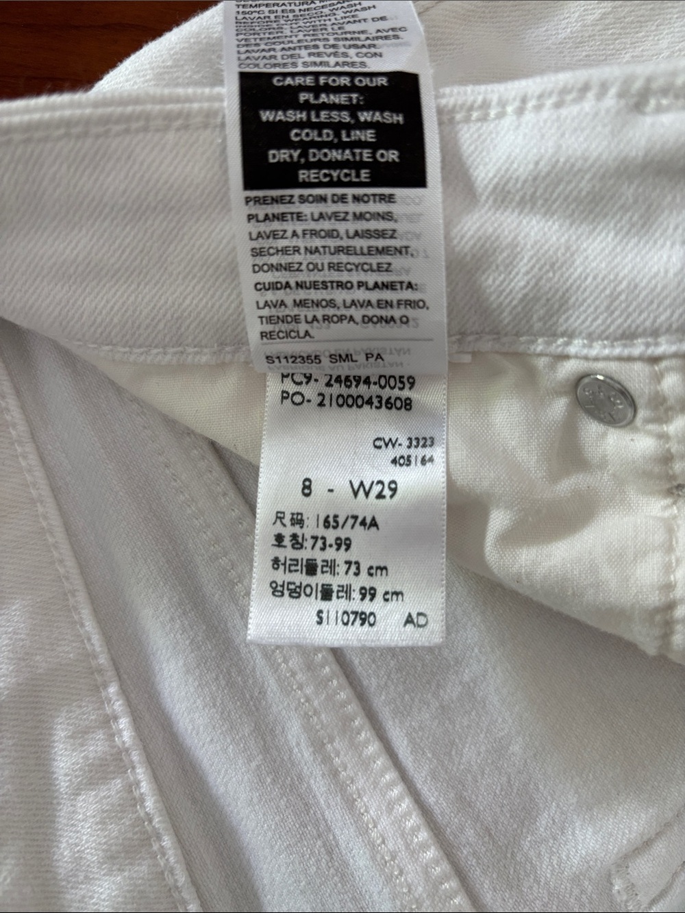 White Capri Levi Jeans with Cuffed Hem - Women - Picture 5 of 5